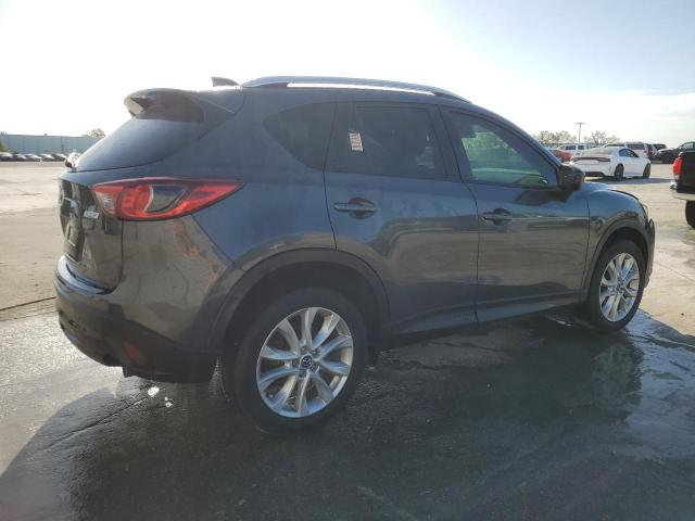 Photo 3 from auction – 2014 MAZDA CX-5 GT with VIN JM3KE2DY6E0353475