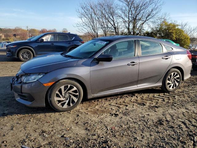 HONDA CIVIC EX 2016 with VIN 19XFC2F76GE094551 - Photo from auction