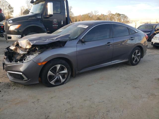 Photo 1 from auction – 2019 HONDA CIVIC LX with VIN 19XFC2F6XKE028049