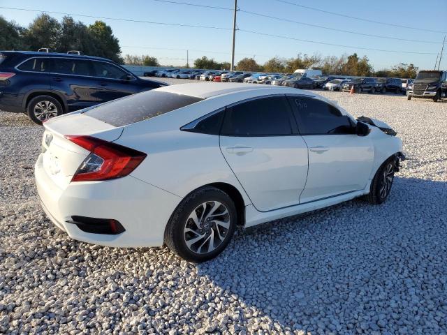 Photo 3 from auction – 2018 HONDA CIVIC LX with VIN 19XFC2F56JE008600