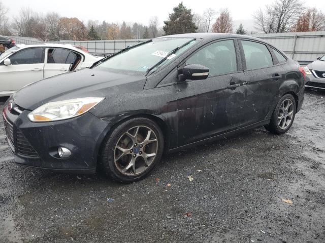FORD FOCUS SE 2014 with VIN 1FADP3F29EL373864 - Photo from auction