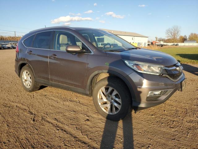 Photo 4 from auction – 2015 HONDA CR-V EXL with VIN 5J6RM4H7XFL053391