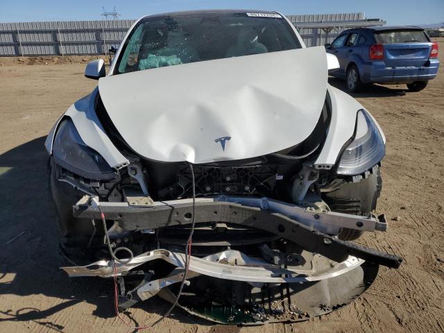 Photo 5 from auction – 2023 TESLA MODEL Y with VIN 7SAYGAEEXPF744308