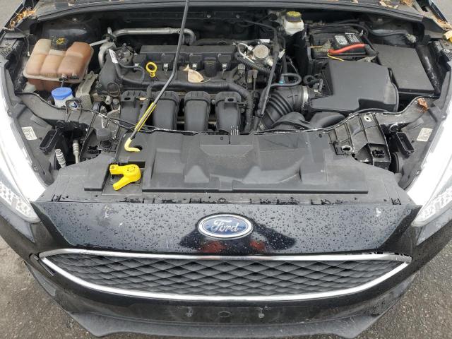 Photo 11 from auction – 2018 FORD FOCUS SE with VIN 1FADP3F21JL306959
