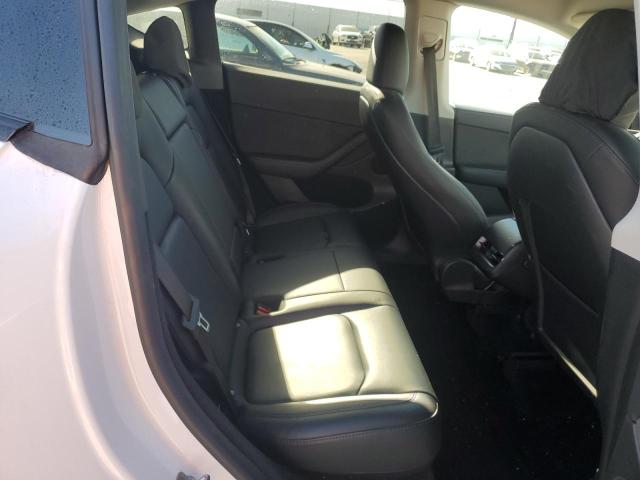 Photo 10 from auction – 2023 TESLA MODEL Y with VIN 7SAYGDED6PF970077