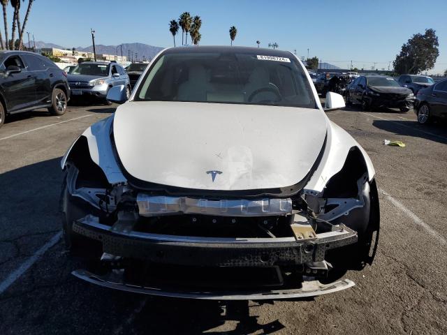 Photo 5 from auction – 2022 TESLA MODEL Y with VIN 7SAYGDEF2NF346436