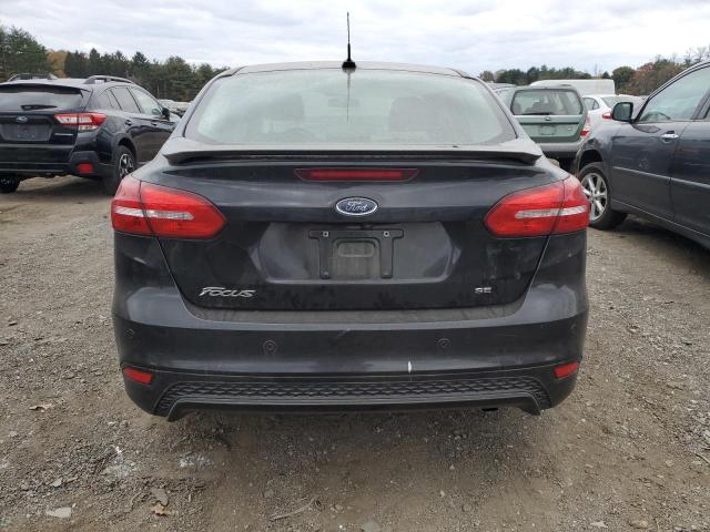 Photo 6 from auction – 2015 FORD FOCUS SE with VIN 1FADP3F23FL253138