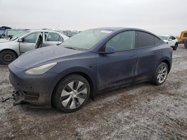 TESLA MODEL Y 2022 with VIN 7SAYGDEE9NF356601 - Photo from auction
