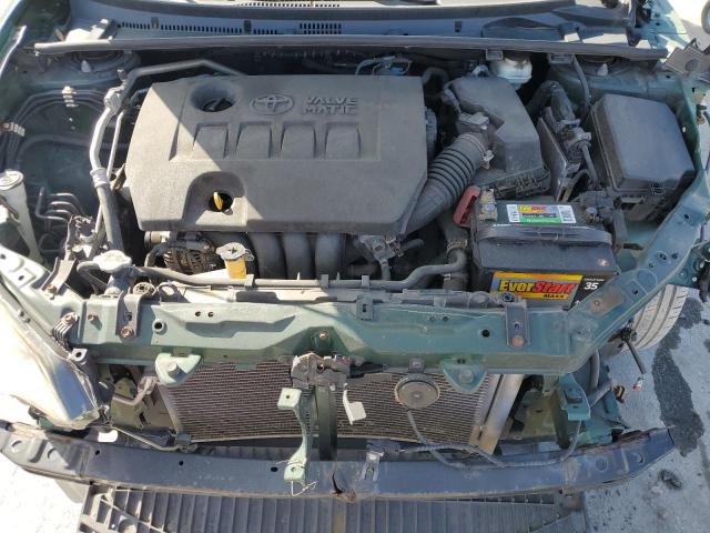 Photo 11 from auction – 2014 TOYOTA COROLLA EC with VIN 2T1BPRHE0EC041105