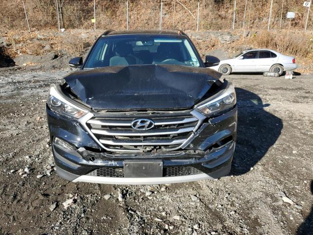 Photo 5 from auction – 2017 HYUNDAI TUCSON LIM with VIN KM8J3CA28HU570583