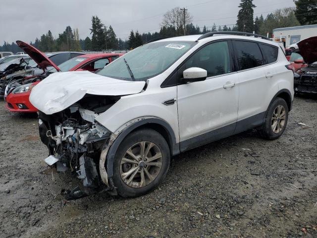FORD ESCAPE SE 2018 with VIN 1FMCU9GDXJUD06305 - Photo from auction