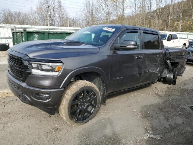 RAM 1500 LARAM 2021 with VIN 1C6SRFJTXMN812819 - Photo from auction