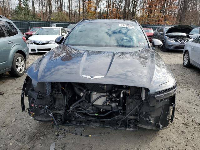 Photo 5 from auction – 2023 GENESIS GV70 BASE with VIN KMUMADTB2PU096782