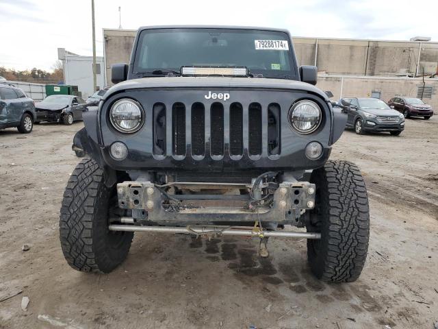 Photo 5 from auction – 2014 JEEP WRANGLER U with VIN 1C4BJWEG1EL188127