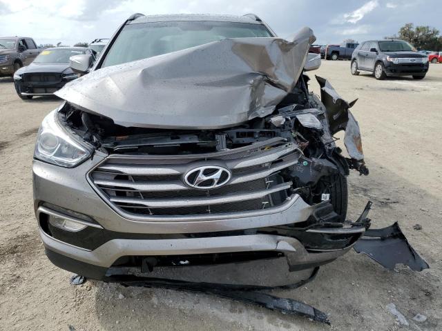 Photo 5 from auction – 2017 HYUNDAI SANTA FE S with VIN 5NMZU3LB6HH006813