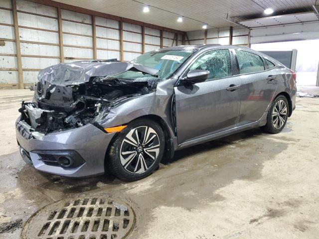 HONDA CIVIC EX 2017 with VIN 19XFC1F37HE004719 - Photo from auction