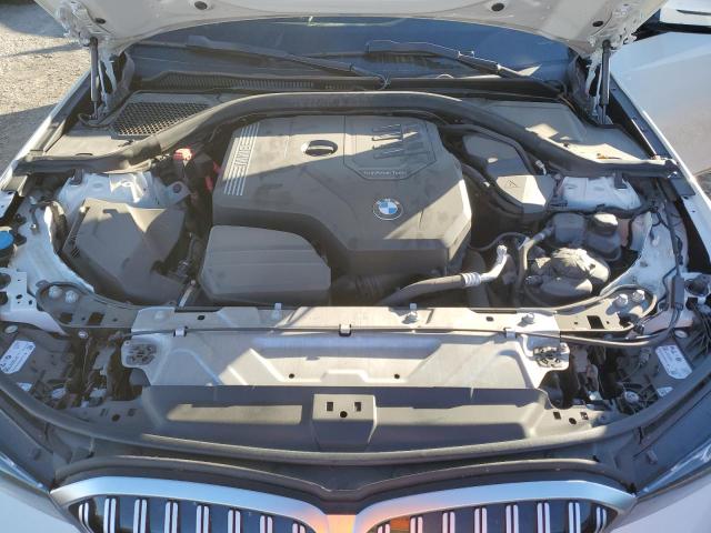Photo 11 from auction – 2023 BMW 330I with VIN 3MW69FF02P8D34327