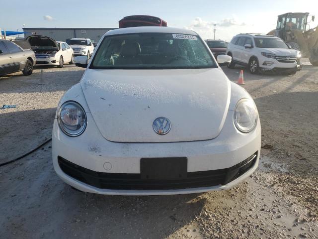 Photo 5 from auction – 2014 VOLKSWAGEN BEETLE with VIN 3VWHP7AT9EM606172