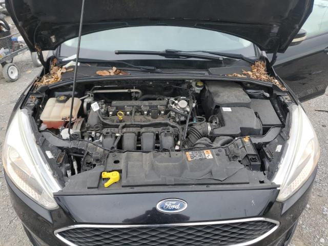 Photo 11 from auction – 2016 FORD FOCUS SE with VIN 1FADP3F22GL397054
