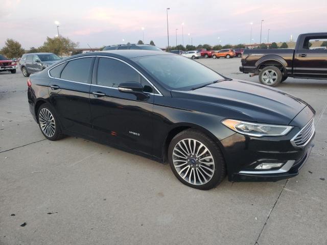 Photo 4 from auction – 2018 FORD FUSION TIT with VIN 3FA6P0RU4JR147277