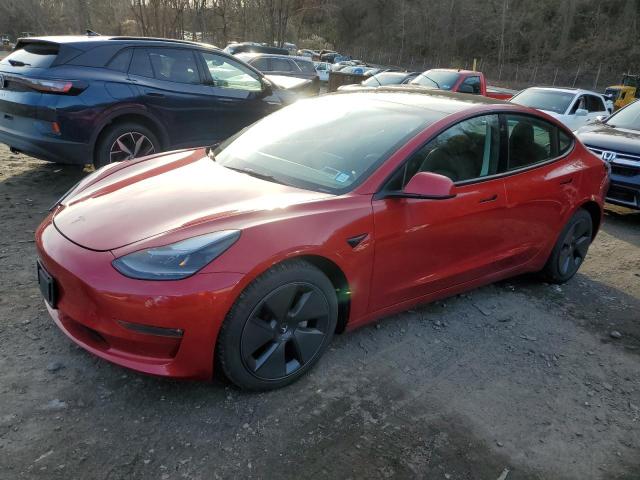 TESLA MODEL 3 2022 with VIN 5YJ3E1EB8NF112827 - Photo from auction