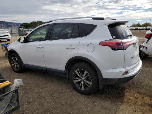 Photo 2 from auction – 2017 TOYOTA RAV4 XLE with VIN JTMRFREV8HD200837