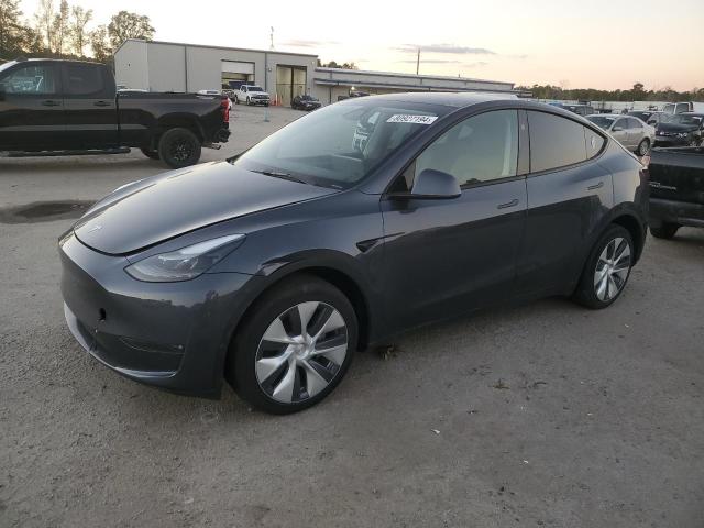 TESLA MODEL Y 2023 with VIN 7SAYGDEE0PA165651 - Photo from auction