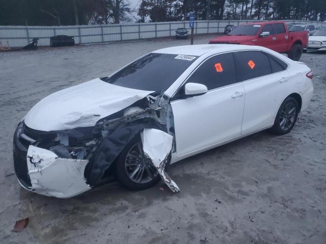 TOYOTA CAMRY LE 2017 with VIN 4T1BF1FK3HU303022 - Photo from auction