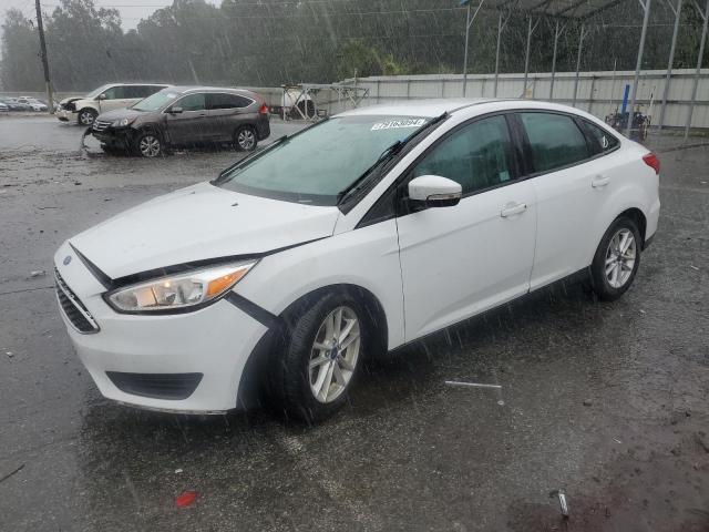 FORD FOCUS SE 2016 with VIN 1FADP3F24GL402416 - Photo from auction