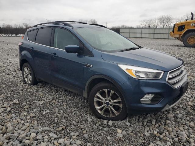 Photo 4 from auction – 2018 FORD ESCAPE SE with VIN 1FMCU9GD4JUC29267