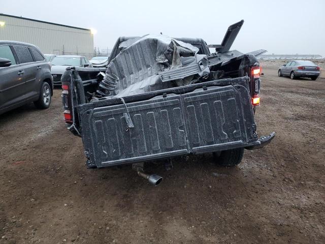 Photo 6 from auction – 2023 RAM 1500 LONGH with VIN 1C6SRFST5PN677946