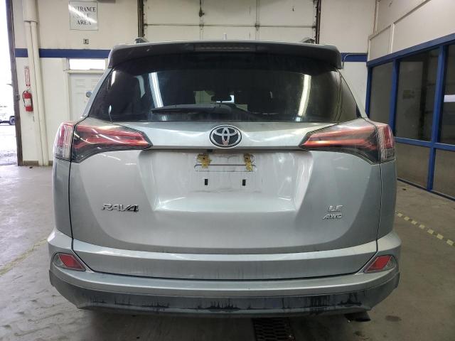 Photo 6 from auction – 2018 TOYOTA RAV4 LE with VIN 2T3BFREV6JW725213