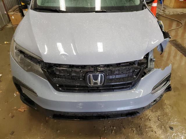 Photo 12 from auction – 2022 HONDA PILOT SE with VIN 5FNYF6H25NB057412