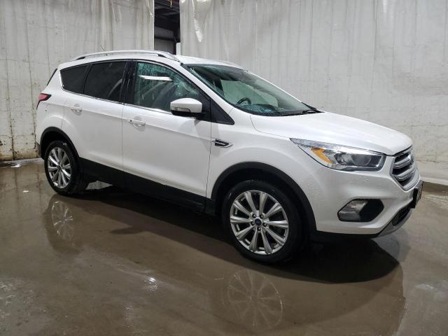 Photo 4 from auction – 2017 FORD ESCAPE TIT with VIN 1FMCU9JDXHUD14598