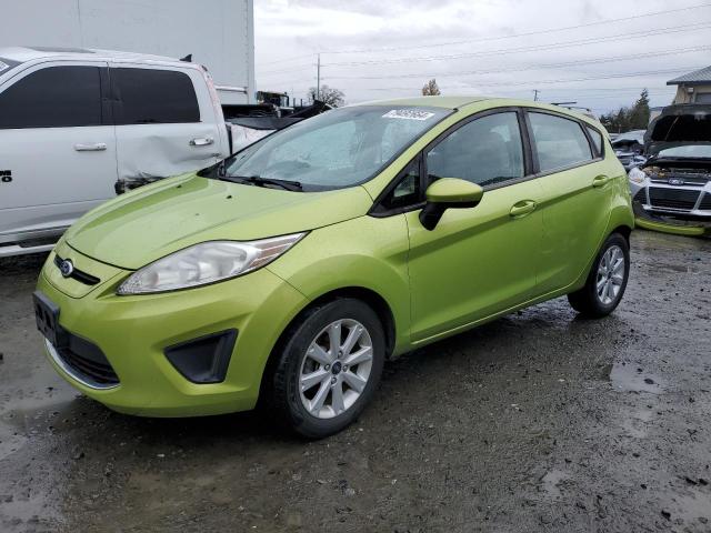 FORD FIESTA SE 2011 with VIN 3FADP4EJ7BM112080 - Photo from auction