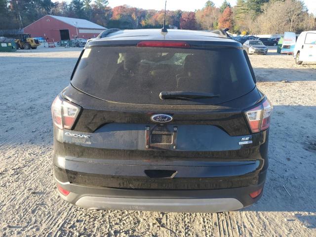 Photo 6 from auction – 2018 FORD ESCAPE SE with VIN 1FMCU9GD7JUD13485