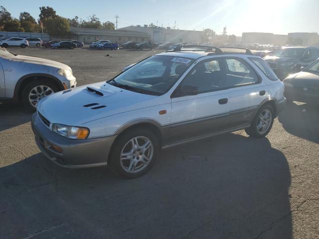 SUBARU IMPREZA OU 1999 with VIN JF1GF4859XG802302 - Photo from auction