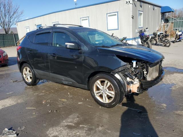 Photo 4 from auction – 2012 HYUNDAI TUCSON GLS with VIN KM8JUCAC0CU419882