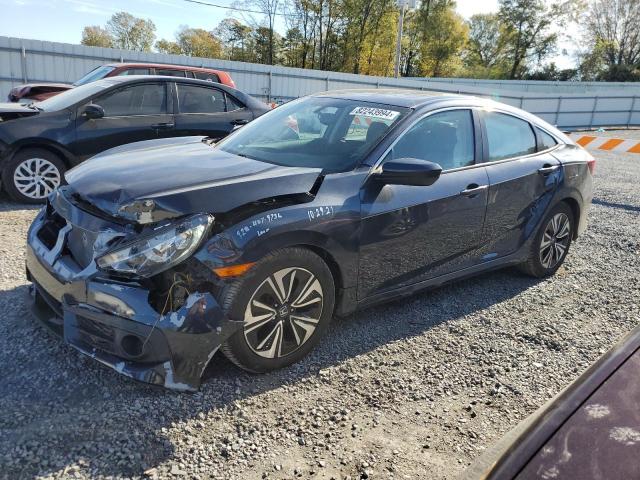 HONDA CIVIC EXL 2016 with VIN 19XFC1F70GE044304 - Photo from auction