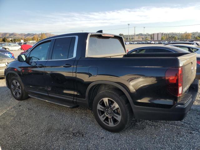 Photo 2 from auction – 2018 HONDA RIDGELINE with VIN 5FPYK2F66JB000390