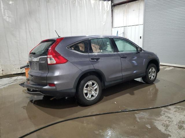 Photo 3 from auction – 2015 HONDA CR-V LX with VIN 2HKRM4H31FH613452