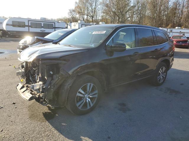 HONDA PILOT EX 2017 with VIN 5FNYF6H30HB051093 - Photo from auction