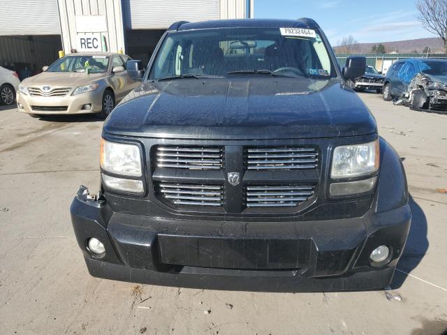 Photo 5 from auction – 2011 DODGE NITRO HEAT with VIN 1D4PU4GKXBW598778
