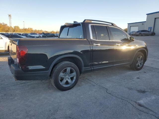 Photo 3 from auction – 2021 HONDA RIDGELINE with VIN 5FPYK3F72MB026746