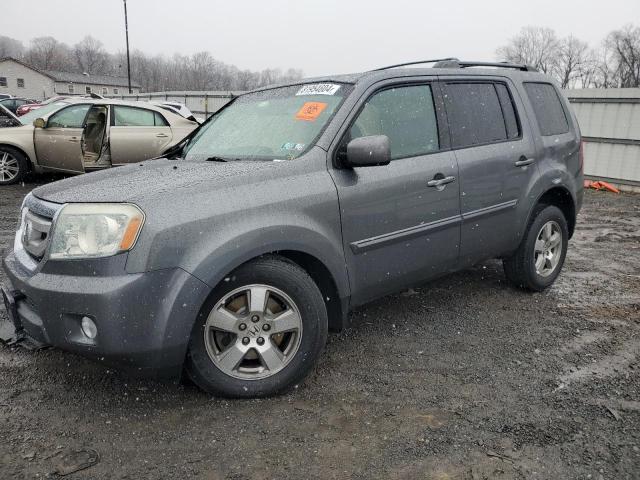 HONDA PILOT EXL 2011 with VIN 5FNYF4H55BB009354 - Photo from auction