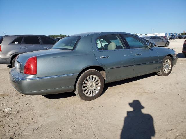Photo 3 from auction – 2004 LINCOLN TOWN CAR E with VIN 1LNHM81W34Y667253