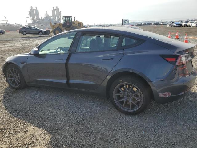 Photo 2 from auction – 2021 TESLA MODEL 3 with VIN 5YJ3E1EBXMF979077