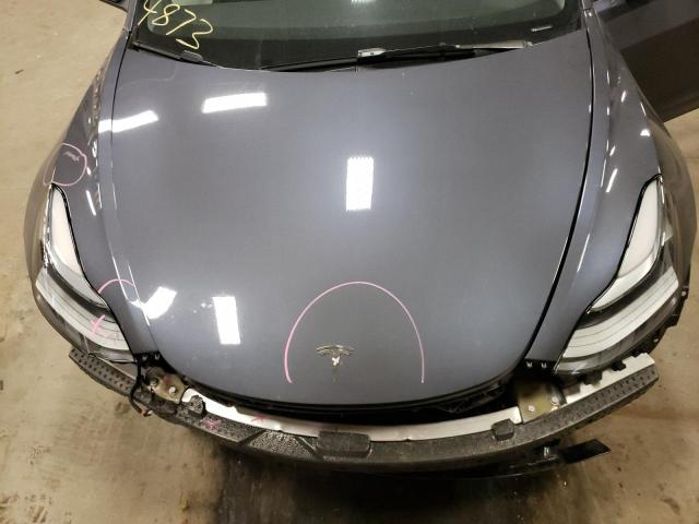 Photo 11 from auction – 2023 TESLA MODEL 3 with VIN 5YJ3E1EAXPF642677