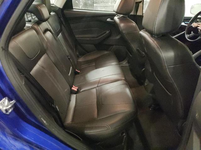 Photo 10 from auction – 2014 FORD FOCUS SE with VIN 1FADP3F20EL406928