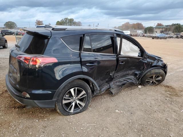 Photo 3 from auction – 2017 TOYOTA RAV4 XLE with VIN JTMWFREV7HD104992